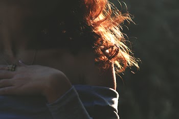 Woman Holder Her Chest