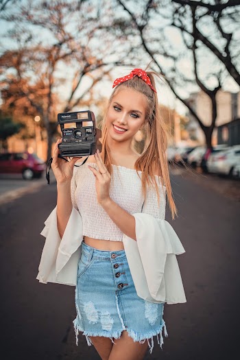 Woman Holding a Camera