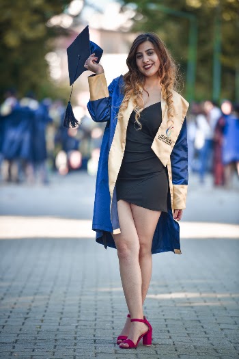 Woman Holding A Graduation Cap