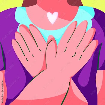 Woman holding a small heart shining while crossing her arms