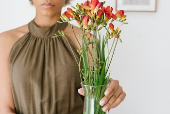 Woman Holding A Vase