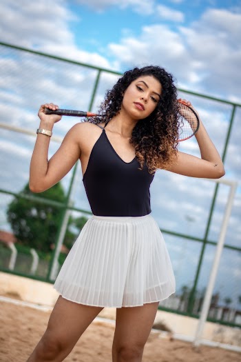 Woman Holding Badminton Racket