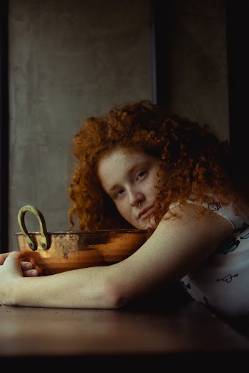 Woman Holding Basin
