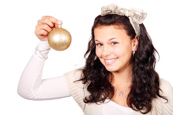 Woman Holding Bauble