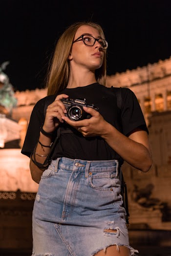 Woman Holding Black Camera