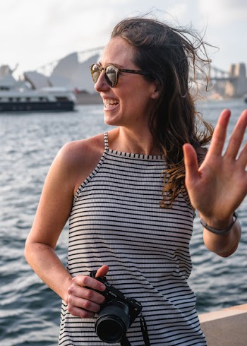 Woman Holding Black Dslr Camera