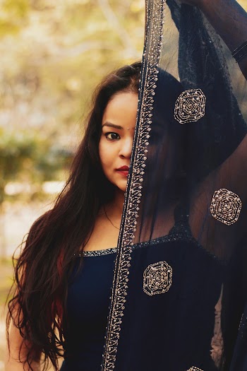 Woman Holding Black Hijab