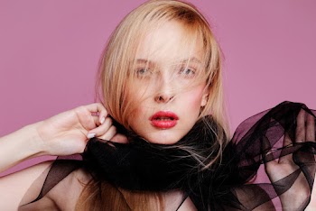 Woman Holding Black Mesh Scarf