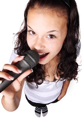 Woman Holding Black Microphone