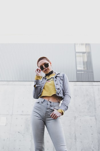 Woman Holding Black Sunglasses Outdoor