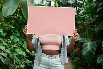 Woman Holding Blank Signboard