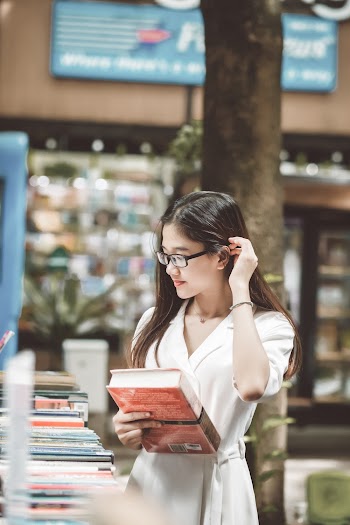 Woman Holding Book