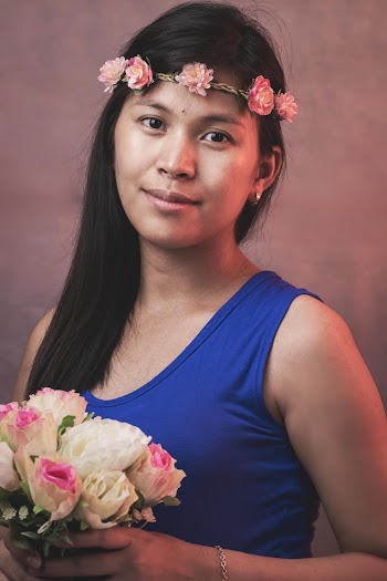 Woman Holding Bouquet of Flower
