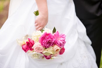 Woman Holding Bouquet of Flowers