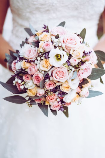 Woman Holding Bouquet of Roses