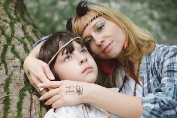 Woman Holding Boy