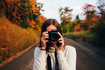 woman holding camera