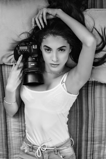 Woman Holding Camera