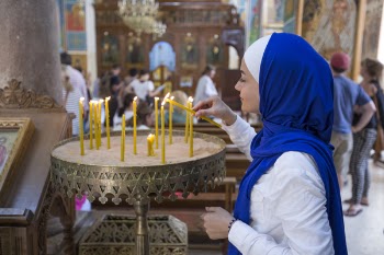 Woman Holding Candle