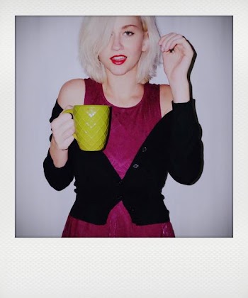 Woman Holding Ceramic Mug While Smiling Photo