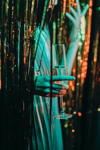 Woman Holding Champagne Flute