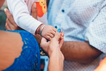 Woman Holding Child Hand