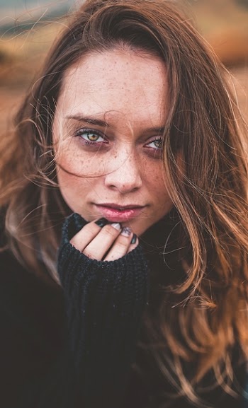 Woman Holding Chin