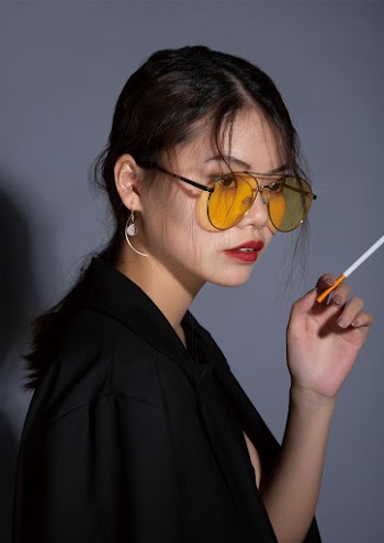 Woman Holding Cigarette