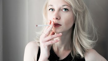 Woman Holding Cigarette Stick