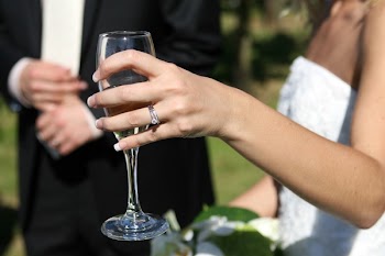 Woman Holding Clear Wine Glass