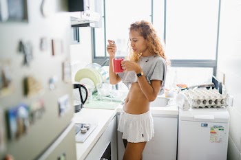 Woman Holding Coffee Mug
