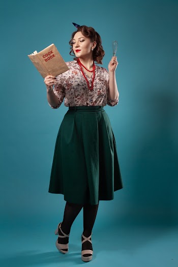 Woman Holding Cook Book