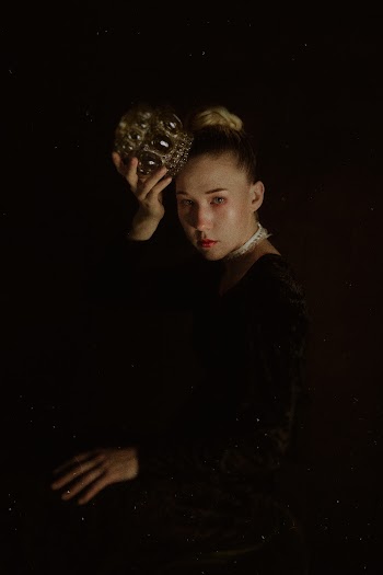 Woman Holding Crown Painting