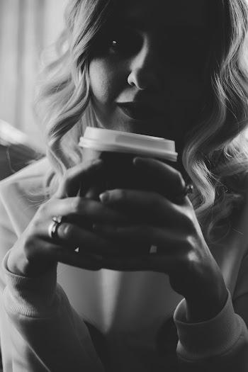 Woman Holding Cup