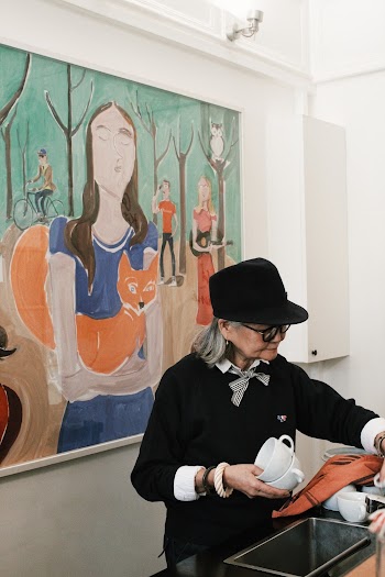 Woman Holding Cup Inside Room