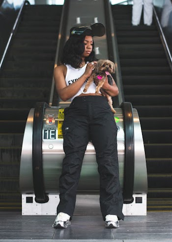 Woman Holding Dog