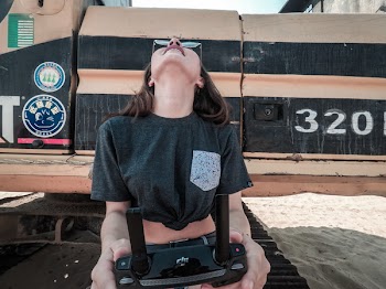 Woman Holding Drone Controller