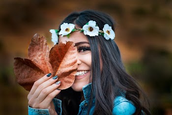 Woman Holding Dry Leaves