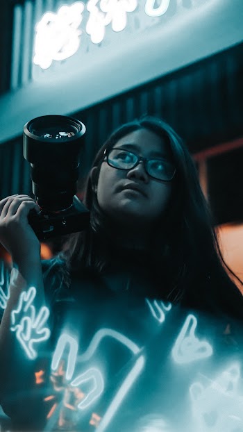Woman Holding Dslr Camera