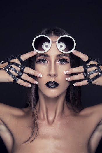 Woman Holding Face