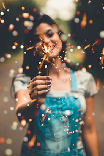 Woman Holding Firecracker