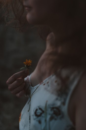 Woman Holding Flower