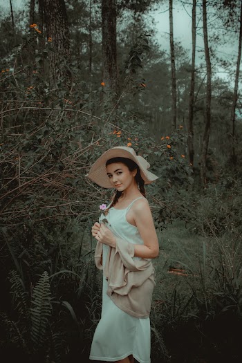 Woman Holding Flower