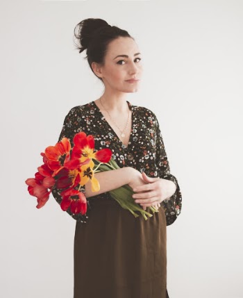 Woman Holding Flowers