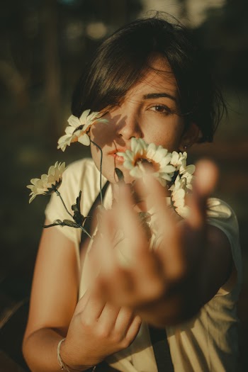 Woman Holding Flowers