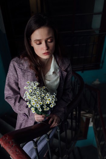 Woman Holding Flowers