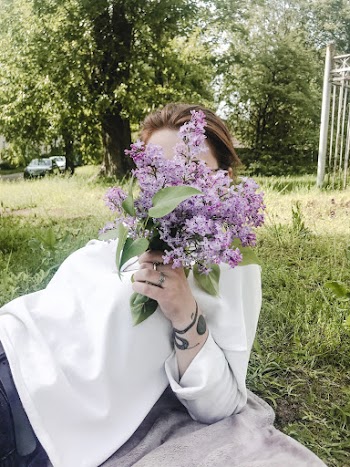 Woman Holding Flowers