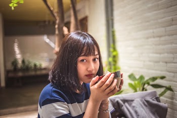 Woman Holding Food Bowl