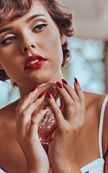 Woman Holding Glass Decor