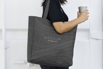 Woman Holding Gray Mockup Tote Bag